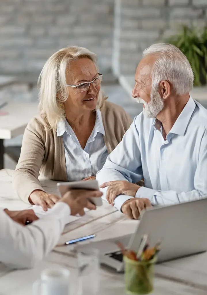 retirees meeting with financial advisor about bonus.webp